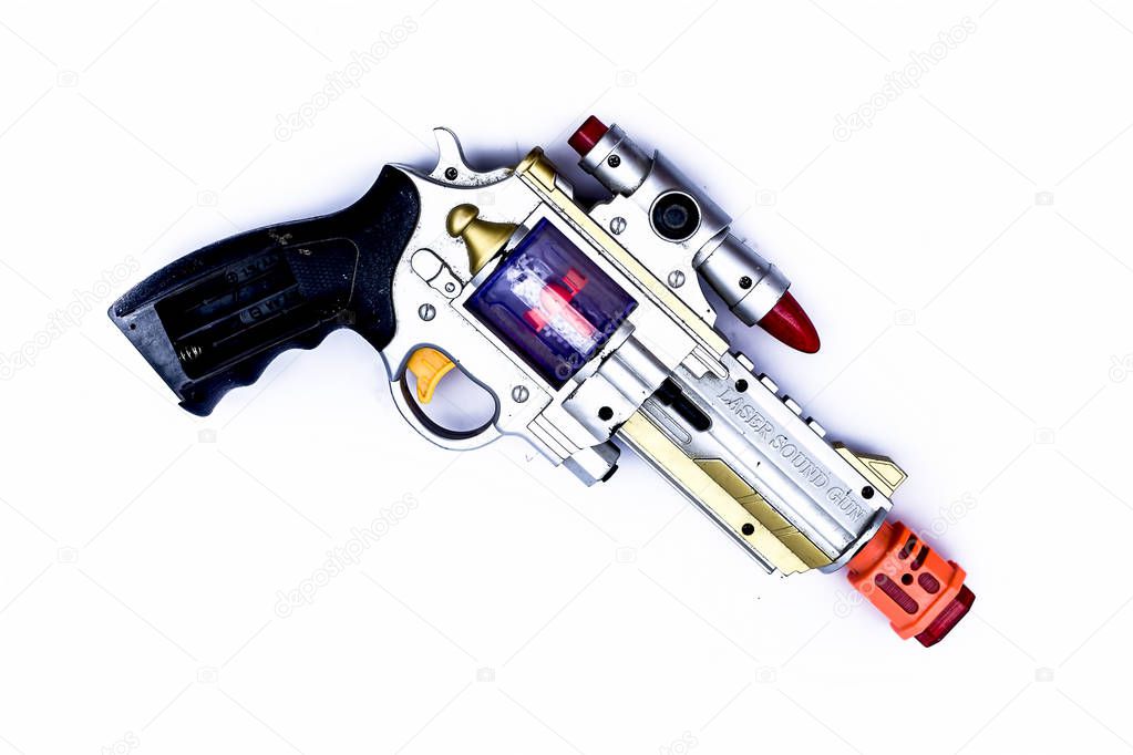 Junagadh-Gujarat-India-November,17th,2018-Close up of toy guns isolated on white use batteries in them.