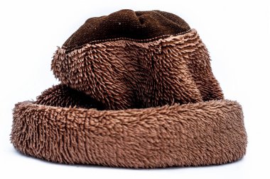 Beyaz izole kahverengi renkli el wooled yün kapağı kapatın.