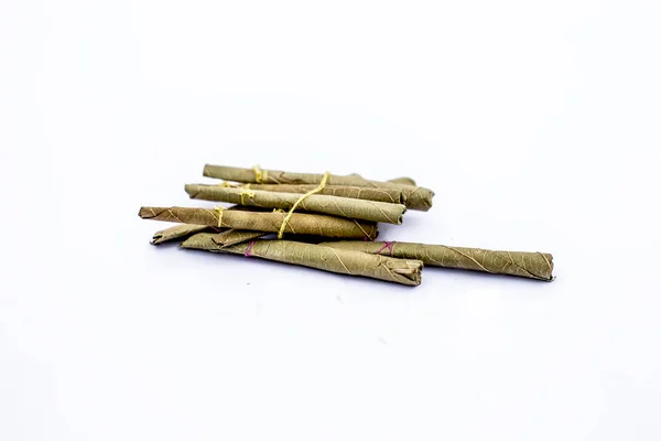 Close up of bidi or thin cigar or small cigarette isolated on white. — Stock Image Close Bidi Thin Cigar Small Cigarette Isolated White Royalty Free Stock Photos