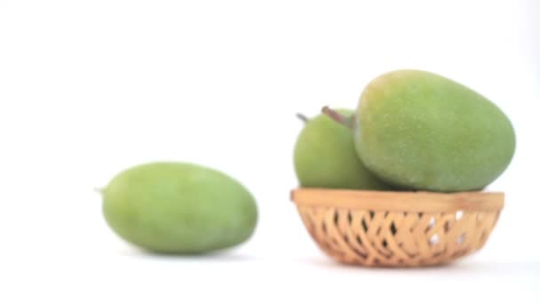 Human Hand Putting Some Raw Green Kesar Mango Isolated White — Stock Video