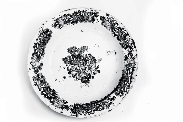 식사에 사용되는 흰색에 골동품 다채로운 접시의 클로즈 — 스톡 사진