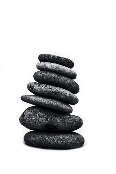 A bunch of pebbles or small stones on each other isolated on whi — Stock Photo, Image