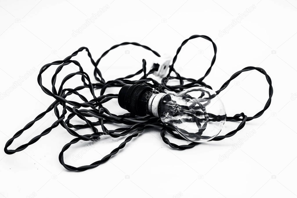 Close up of bulb with holder and red black color wire with it isolated on white.