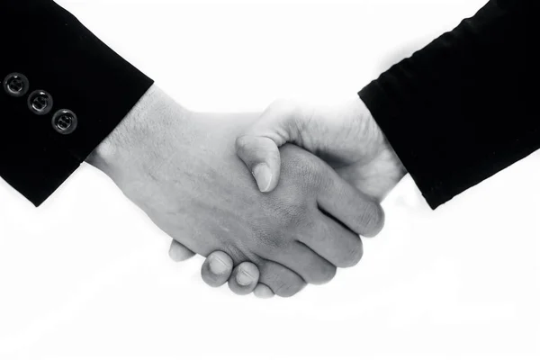 特写两位不同商人的牵手 在白色握手概念上隔离交易 — 图库照片