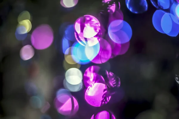 Close up of bokeh background of Christmas lights or new year celebration used as background or texture for designing and for photo manipulation.