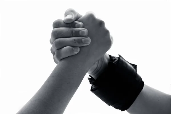 Male Hand Wearing Black Colored Wrist Weights Helping Other Female — Stock Photo, Image