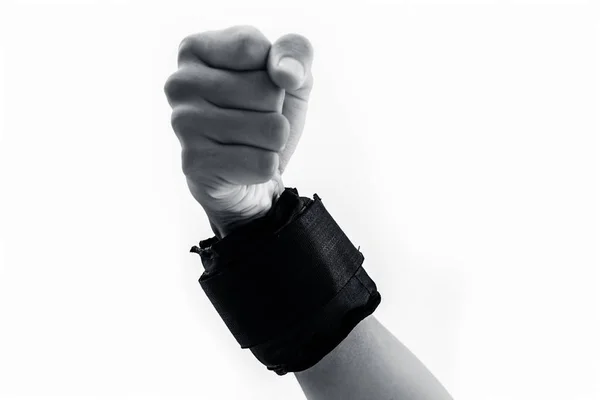 人的手一个男性隔离在白色穿黑色的腕带或手腕重量 — 图库照片