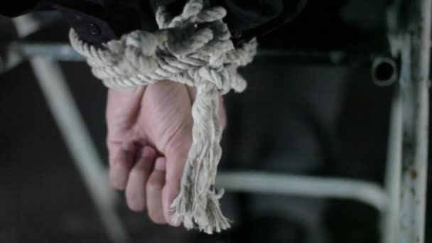 Close Human Hands Tied White Colored Rope Sitting Metal Chair — Stock Video