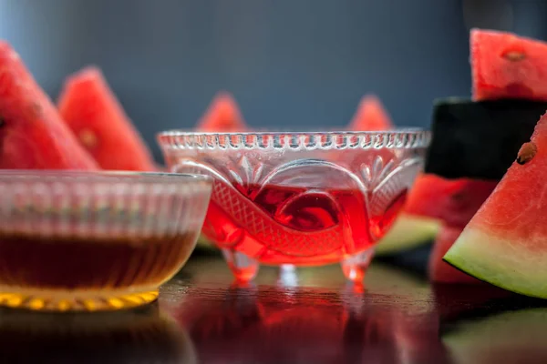 Watermelon face pack or face mask for extra soft glowing skin especially for the type of people having oily skin,Consisting of Watermelon pulp and honey well mixed in a glass bowl.