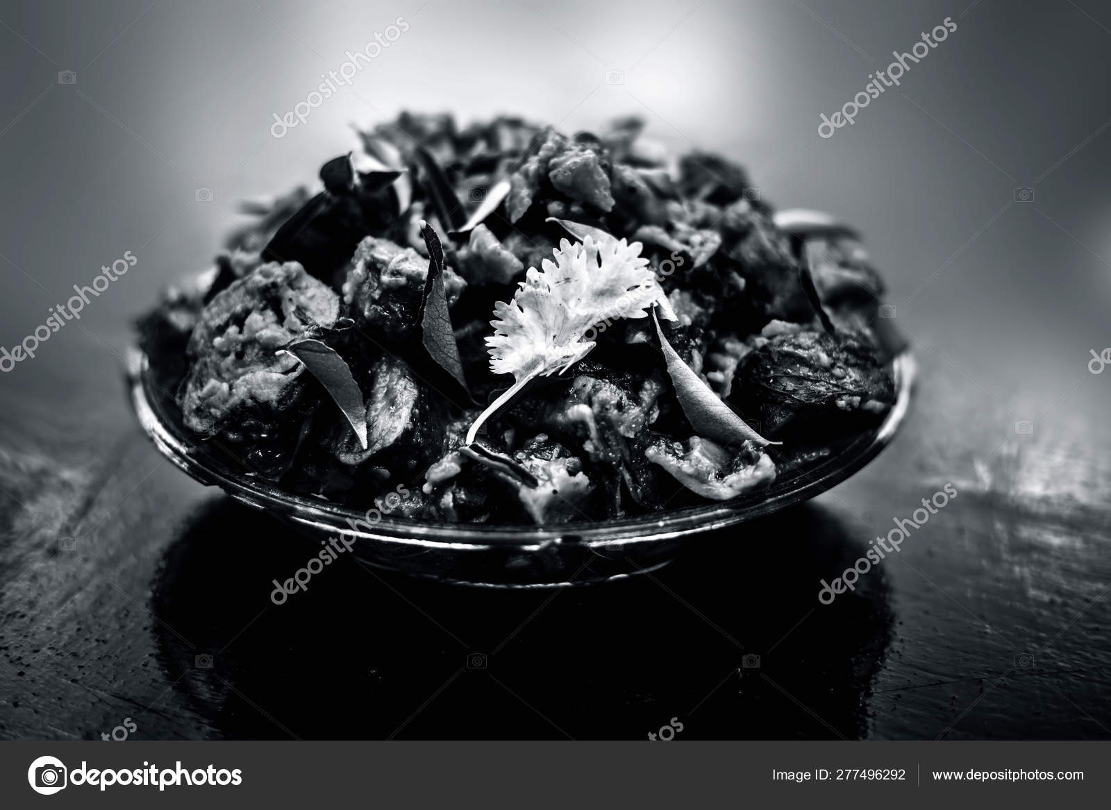 Famous Indian Gujarati Snack Dish Glass Plate Wooden Surface Patra