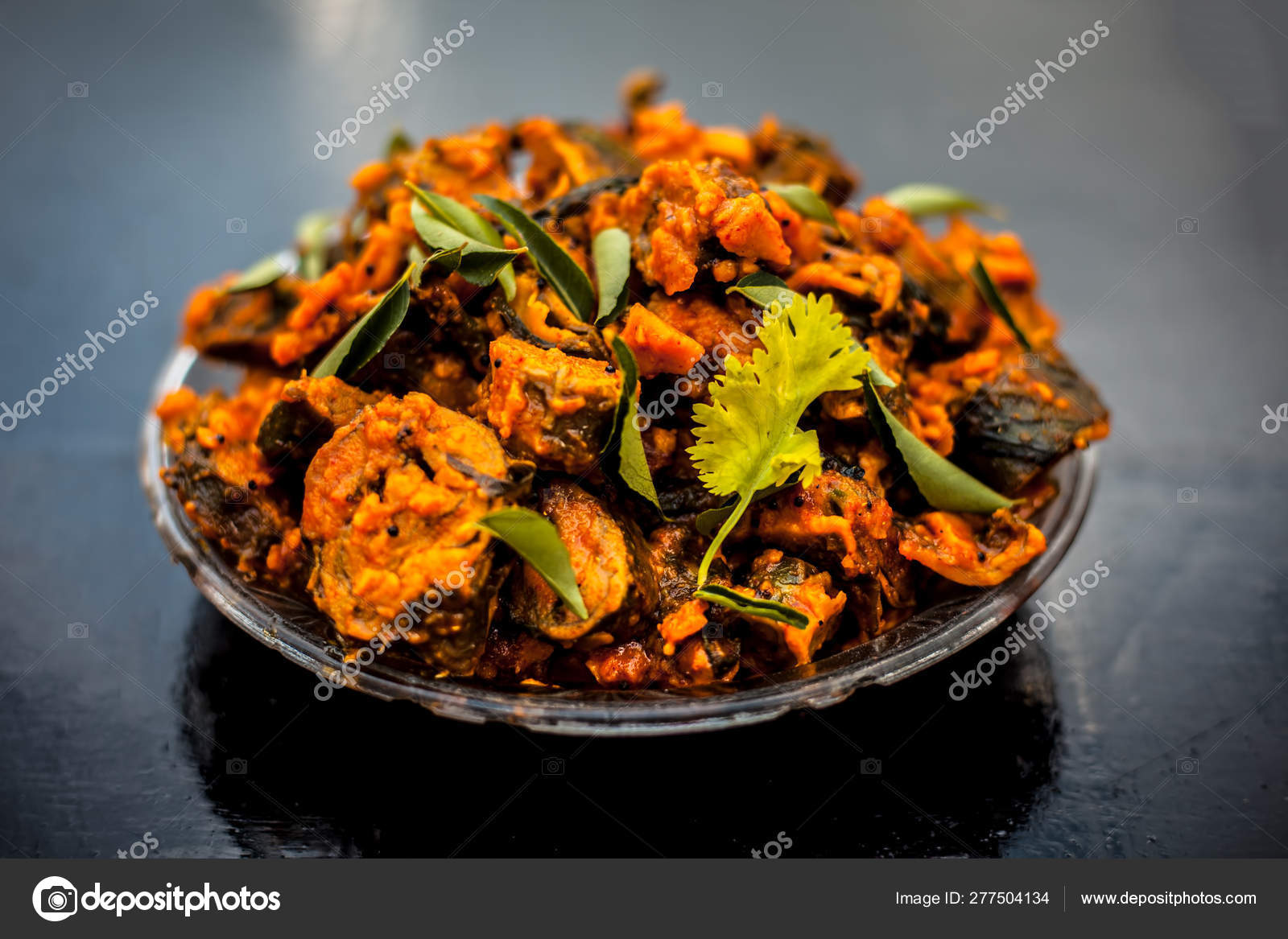 Famous Indian Gujarati Snack Dish Glass Plate Wooden Surface Patra