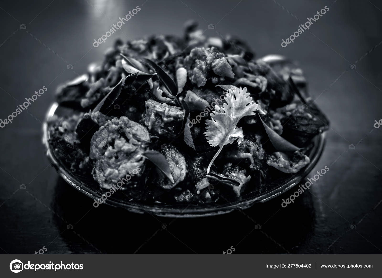 Famous Indian Gujarati Snack Dish Glass Plate Wooden Surface Patra