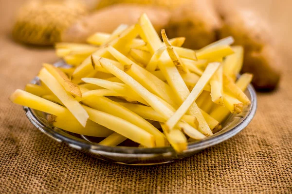 Cut French Fries Glass Plate Raw Potatoes Burlap Surface — Stock Photo, Image