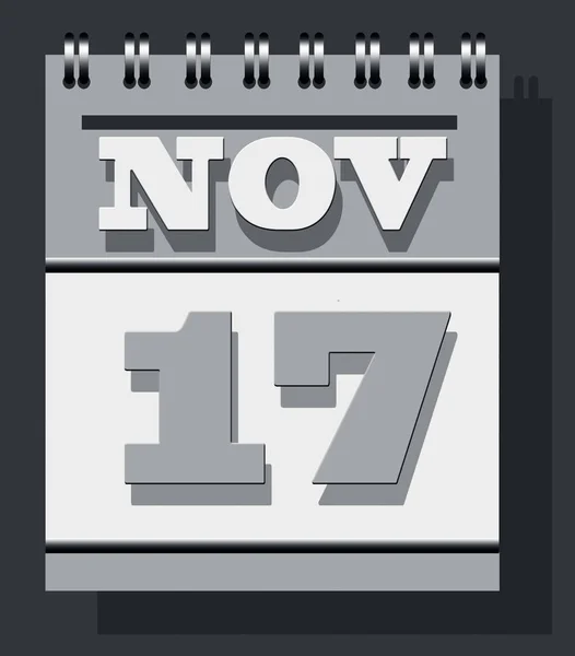 Daily leaf spiraled calendar page isolated on grey colored wall textured background with the page open of date 17 November