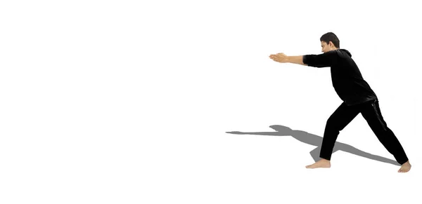 Mand Teenager Gør Yoga Motion Eller Strække Motion Isoleret Hvid - Stock-foto