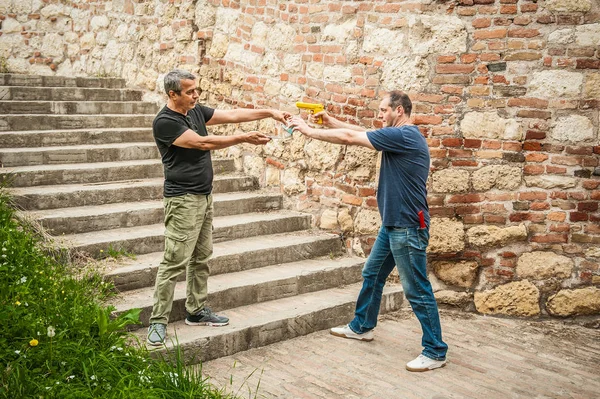 Robber Gun Taking Money Victim Abandoned Part City Gun Point — Stock Photo, Image