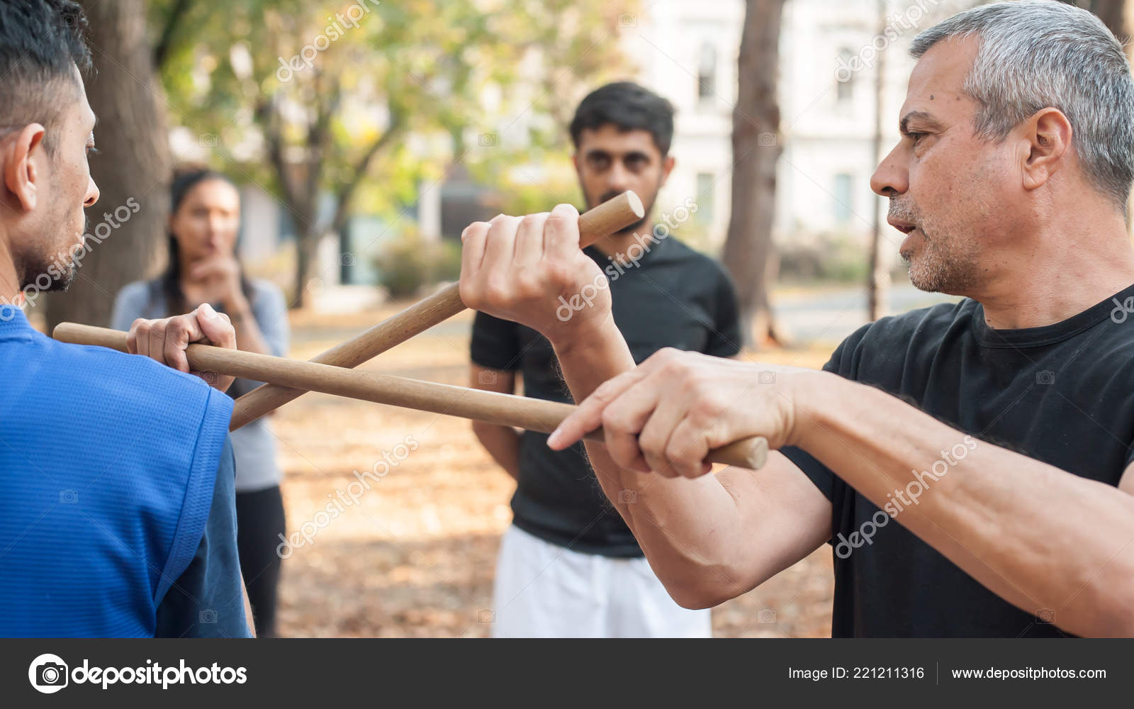 Escrima and kapap instructor demonstrates sticks fighting