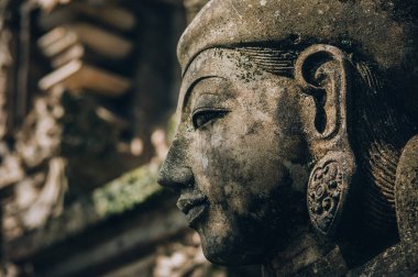 Portre portre geleneksel taş heykel sanat formu Hindu Budist kültür etkileri göstermek tapınaklar dahil. Bali, Endonezya