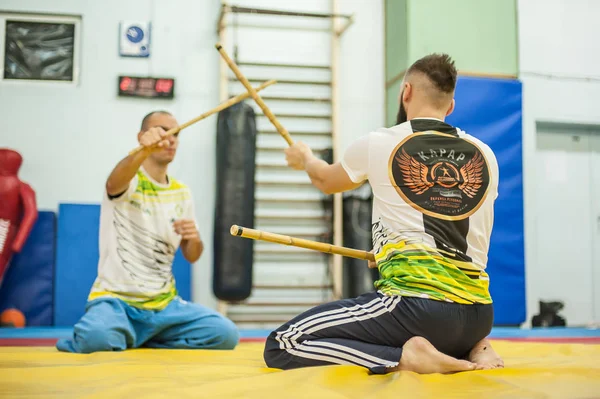 Large Group Students Practice Filipino Eskrima Arnis Stick Fight Techniques  Stock Photo by ©guruxox 356873870