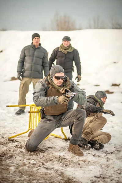 Gun shooting training course with instructor in cafe bar environment — Stock Photo, Image