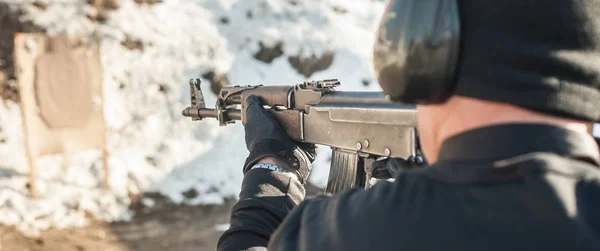 Civilian shooting training from rifle machine gun on shooting range