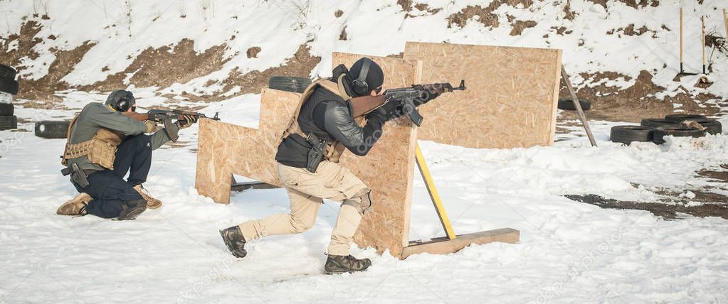 Special forces action shooting and moving defensive rifle firearm training