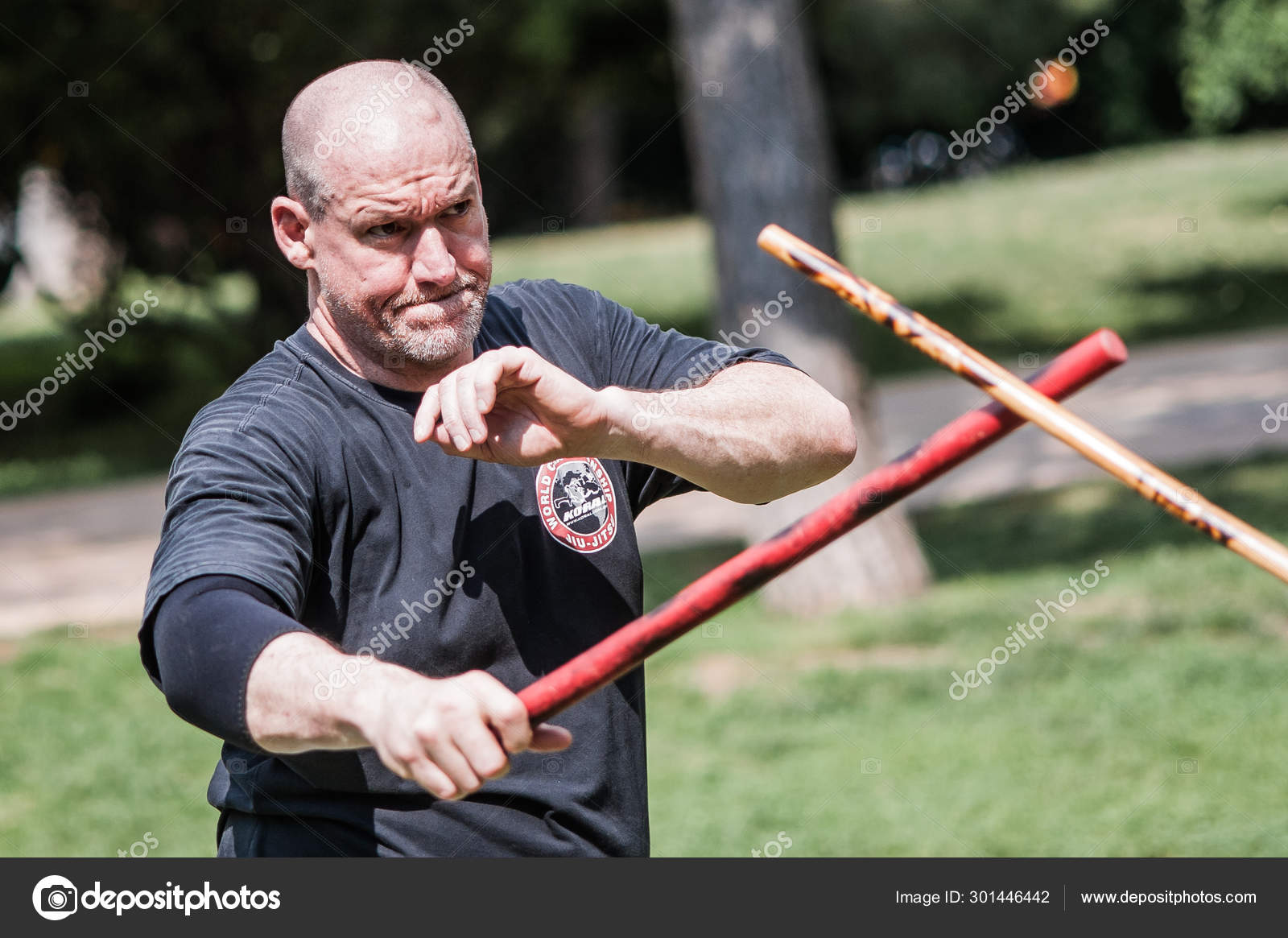 Escrima and kapap instructor demonstrates sticks fighting