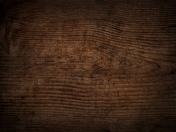 Eski çizilmiş koyu ahşap meşe tahtası çatlaklar antika arka plan ile