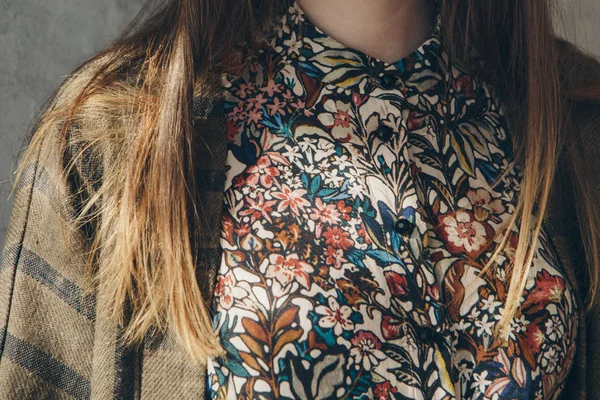 collar clothes with pattern dressed on girl close up