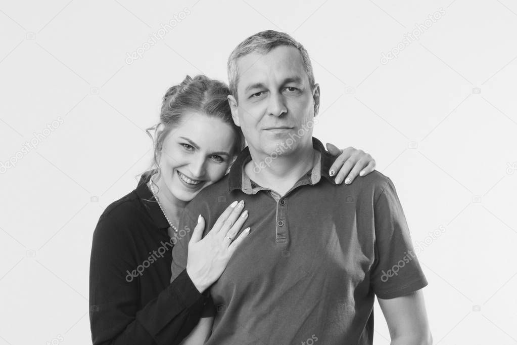 couple in love hugs on white background. man and woman smiling. Valentine's day