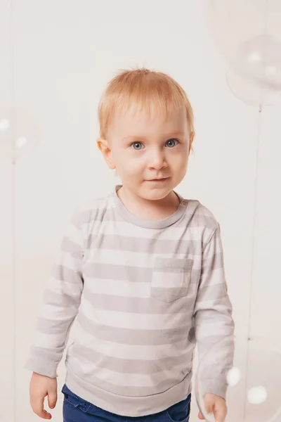 Portrait of a happy child on a white background — Stock Photo, Image