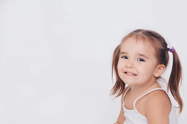 Portrait of a happy child on a white background. concept of childhood, healthcare, IVF — Stock Photo, Image