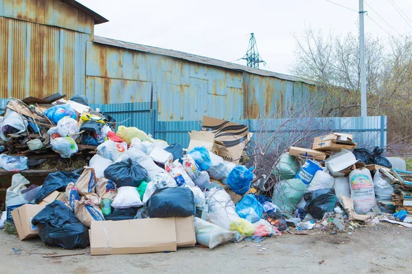 pile of waste in a container. garbage collapse. Janitors \' strike. environmental disaster of plastic recycling