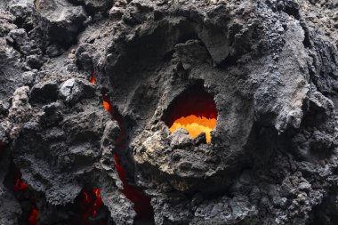 Close-up of a lava flow of volcano Kilauea on Hawaii clipart