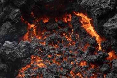 Close-up of a lava flow of volcano Kilauea on Hawaii clipart