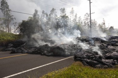 Highway in Hawaii, which was destroyed by a lava flow clipart