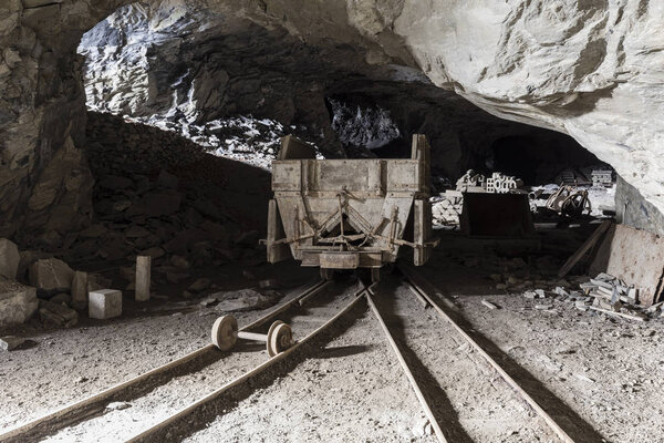 Mining trolley in a tunnel of an abandoned lime mine in Switzerland