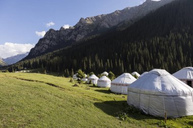 Yurt Camp in the valley of Altyn-Arashan near Karakol in Kyrgyzstan clipart