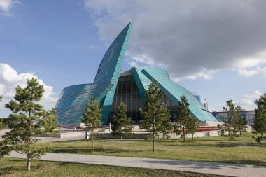 Astana, Kazakhstan, August 2 2018: Kazakhstan Central Concert Hall for performing arts, and was designed by Italian architect Manfredi Nicoletti clipart