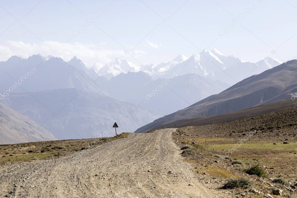 Beautiful landscape in the Pamir mountains. View from Tajikistan towards Afghanistan in the background with the mountain peaks