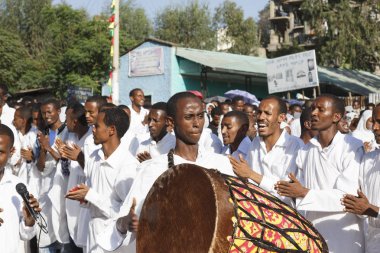 Gonder, Ethiopia, February 18 2015: People dressed in traditional attire celebrate the Timkat festival, the important Ethiopian Orthodox celebration of Epiphany clipart