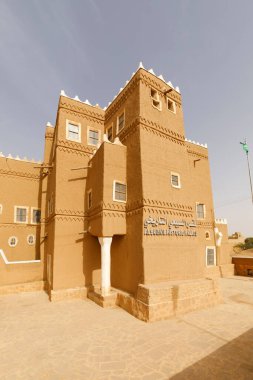 Al Subaie historic palace in Shaqra, Saudi Arabia. This house is traditional restored with clay bricks clipart