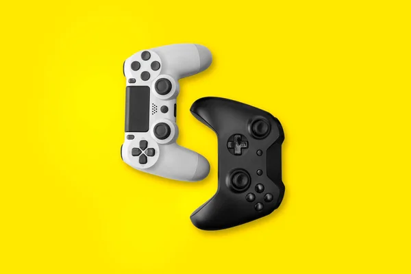 White Black Game Controllers Yellow Background — Stock Photo, Image