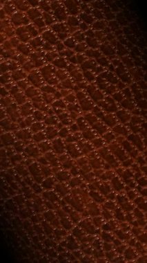 Dönüşümlü doğal kahverengi deri kaliteli yüzey, özel lüks arka plan tasarımı ile zarif dokunsal rahatlamayı vurguluyor.