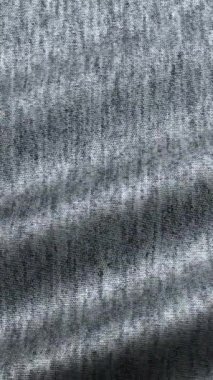 Yumuşak gri pamuk dalgaları sinemanın zarafetiyle hafifçe dalgalanır, asgari moda projeleri ve rafine tekstil sanatları ilham verir.