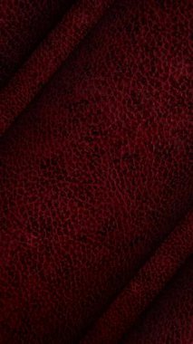 Esmerler için tasarlanmış, kaliteli lüks eşyalar ve özel aksesuarlar üreten, dramatik dokuma dönüşümlü koyu kırmızı derili.