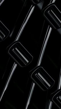 Geleceğin parlak siyah figürleri, eşsiz lüks rafine bir arka planda metalik yansımalarla pürüzsüz bir şekilde döner.