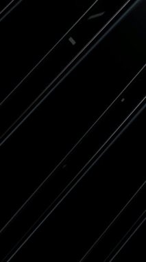 Lüks modern arkaplan çerçeveleri, bitmeyen dönüşler sırasında parlak metalik aksanlarda parıldayan siyah figürler.