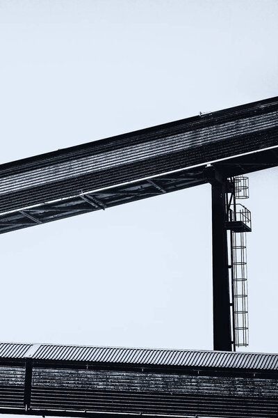 Abstract and monochrome image of a conveyor system in the port of Rostock Warnemuende