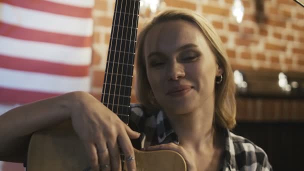 Charming young girl with guitar — Stock Video